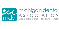 Michigan Dental Association, MDA, logo in dark grey and turquoise