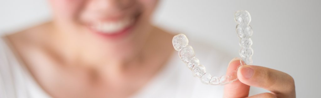 Invisalign clear aligners.