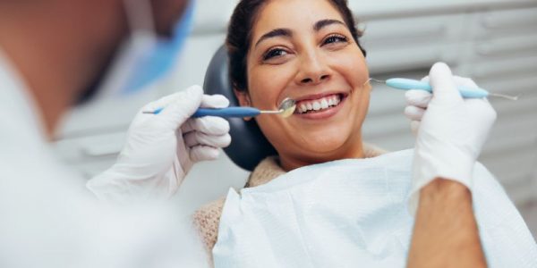Woman getting her dental checkup.