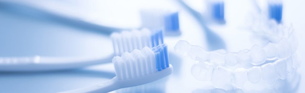 toothbrushes and Invisalign trays.