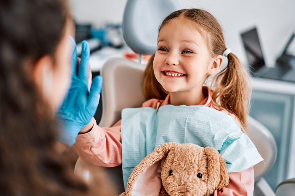 young girl at the dentist