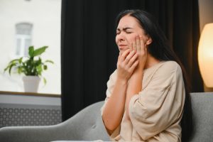 woman in tooth pain