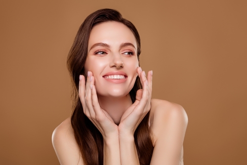 woman smiling after botox treatment